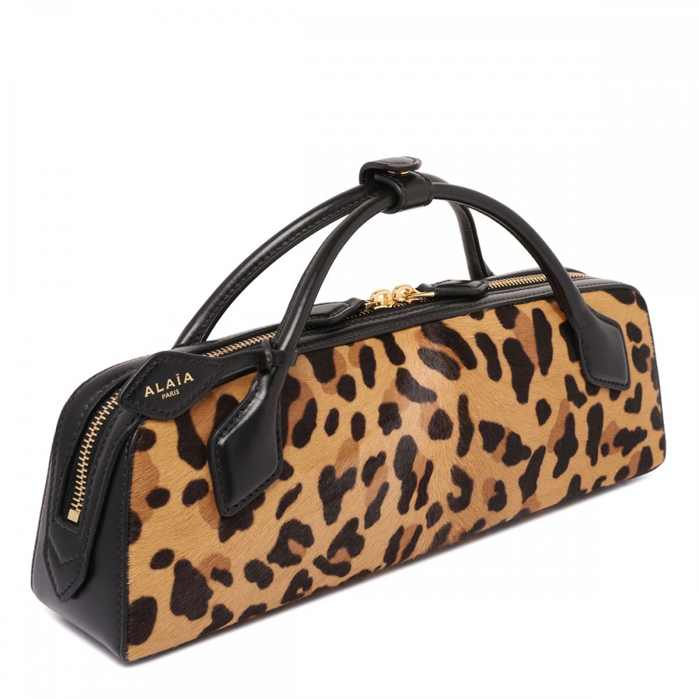 Teckel leopard clutch
