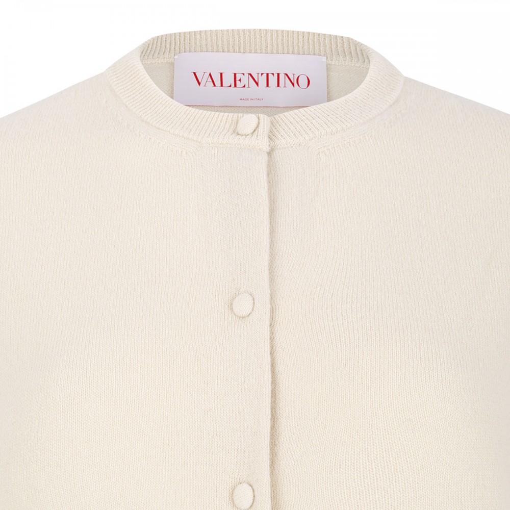 Cardigan with feathers