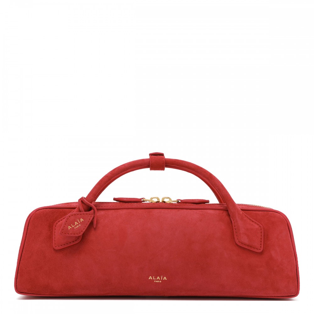 Le Teckel suede clutch bag