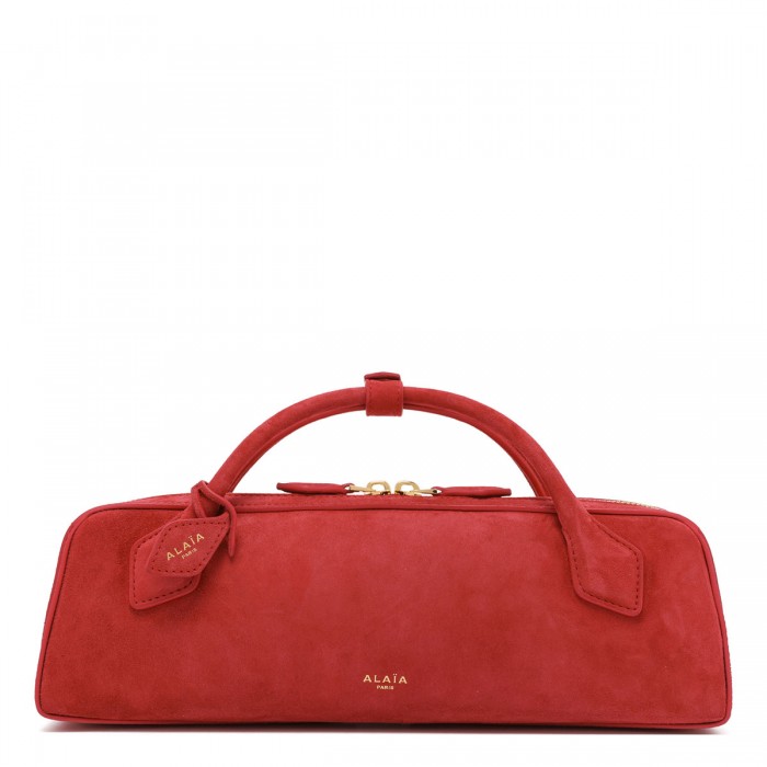 Le Teckel suede clutch bag