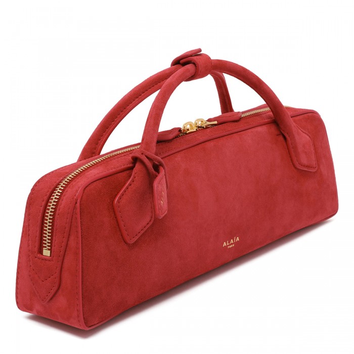 Le Teckel suede clutch bag