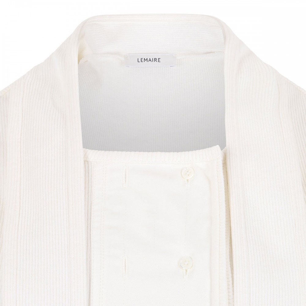 Asymmetrical fitted top