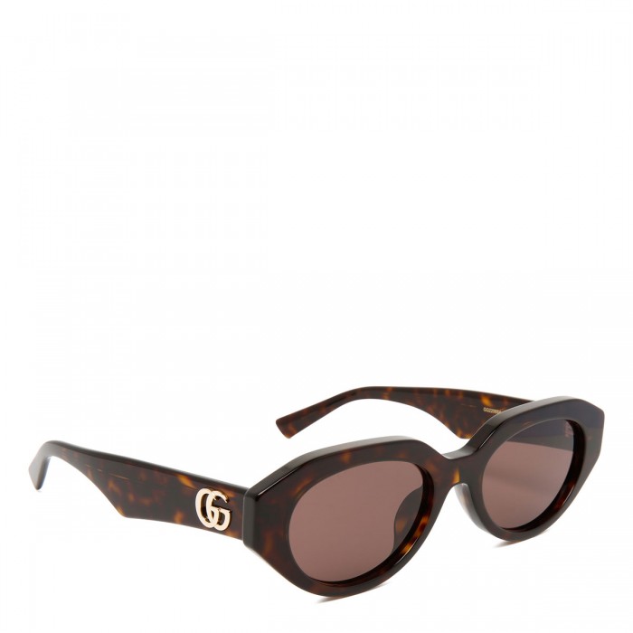 Brown tortoiseshell oval sunglasses