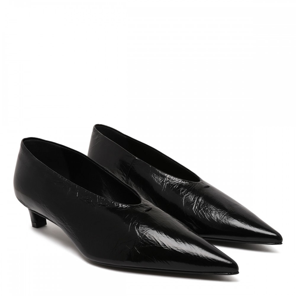Black leather pumps
