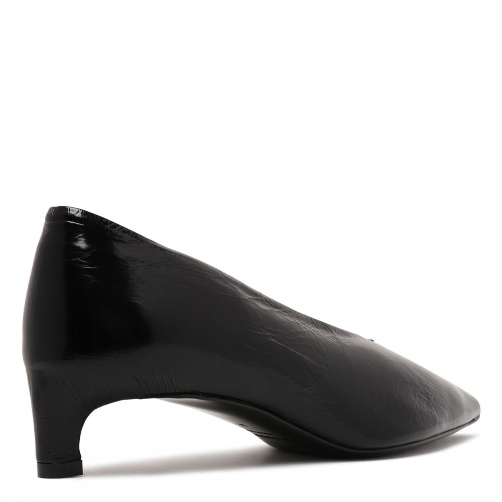 Black leather pumps