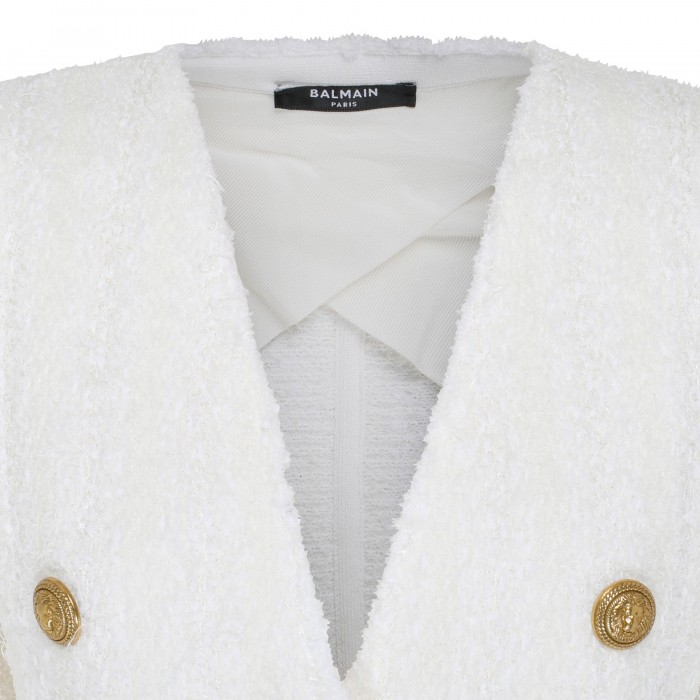 Collarless white tweed jacket