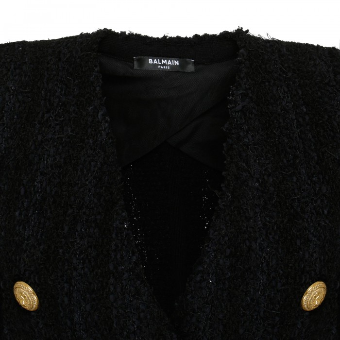 Collarless black tweed jacket